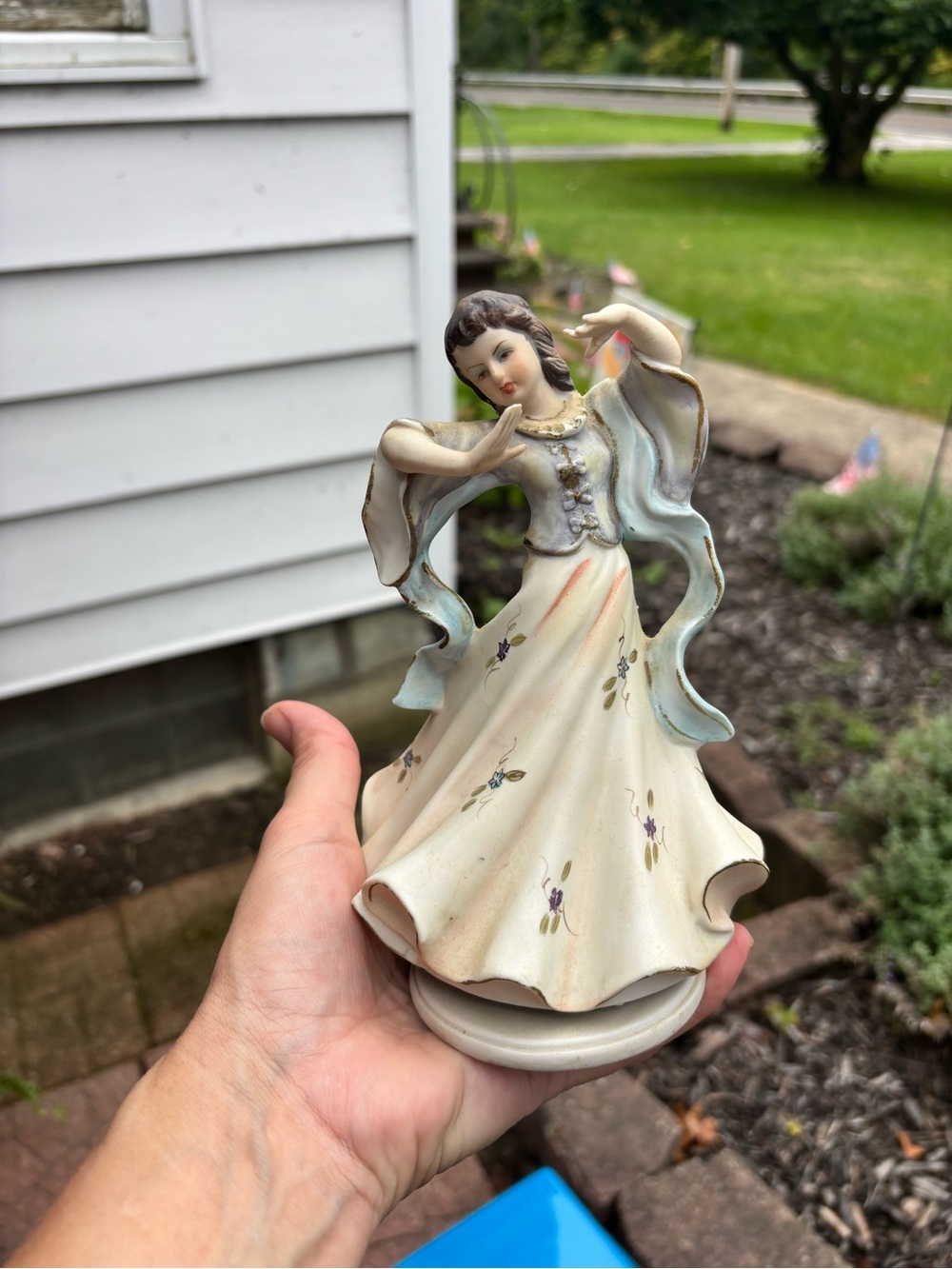 Cream Porcelain Dancing Lady Figurine with Pale Blue Accents